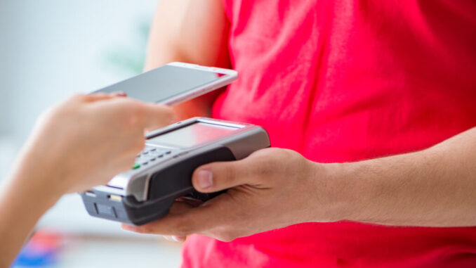 Concept of paying with POS terminal